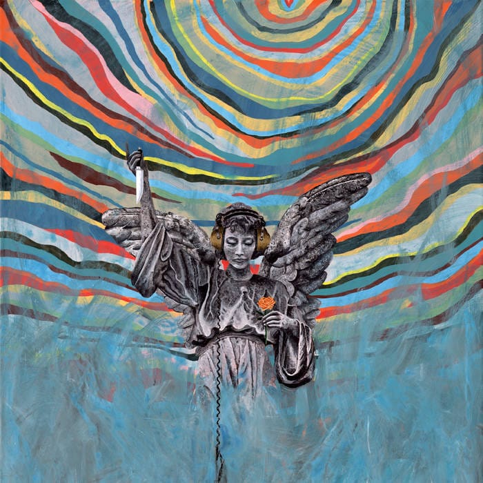 The cover of Motion City Soundtrack's "The Same Old Wasted Wonderful World" depicting a statue of an angel posing like the Statue of Liberty, holding a flower and a knife and wearing headphones, all against an abstract background of oranges, yellows and blues